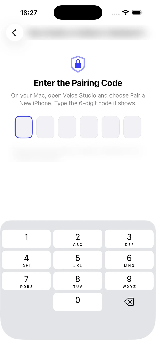 iPhone screen with a lock icon and the heading Enter the Pairing Code. Six empty boxes for a six digit code and a number pad. The title line and one small line under the boxes are blurred.