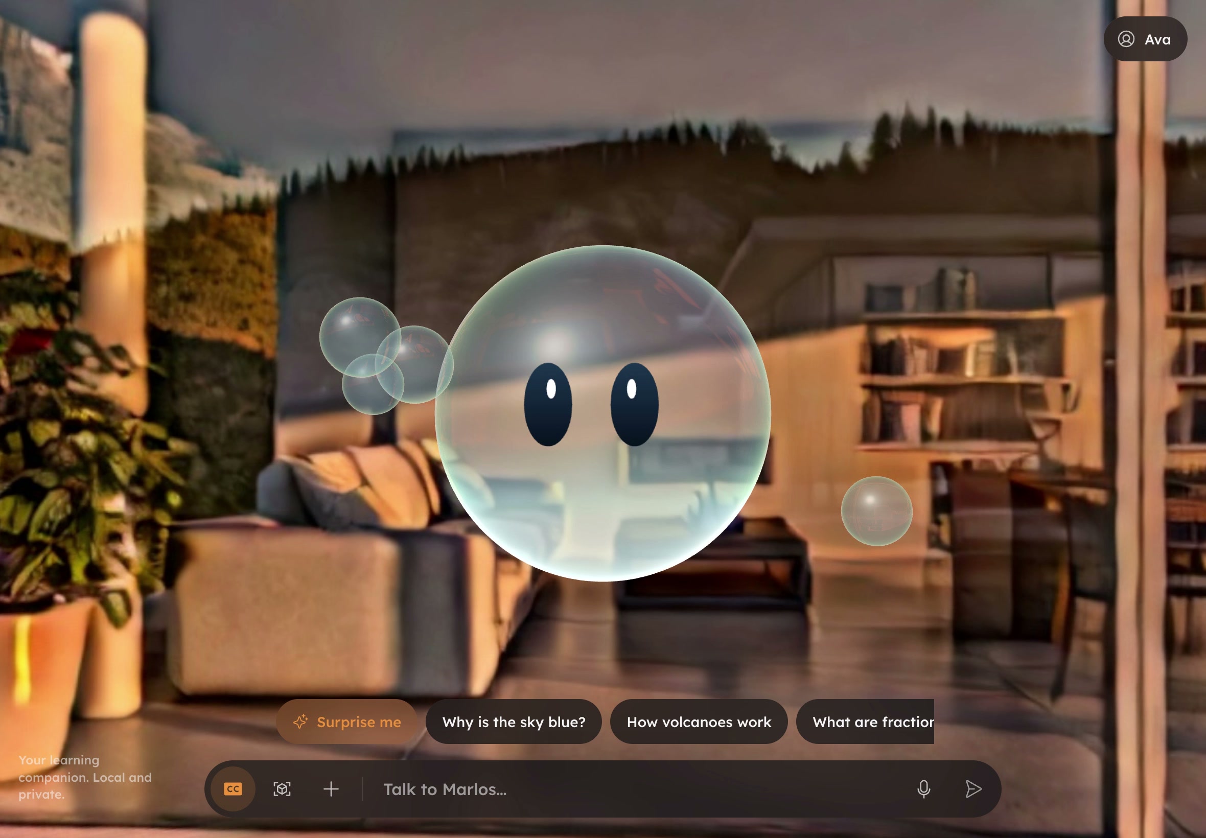 Still of the Marlos companion on a tablet: Marlos, a glass bubble with two dark eyes, floats in a warm living room above suggestion chips and a bar that reads Talk to Marlos.