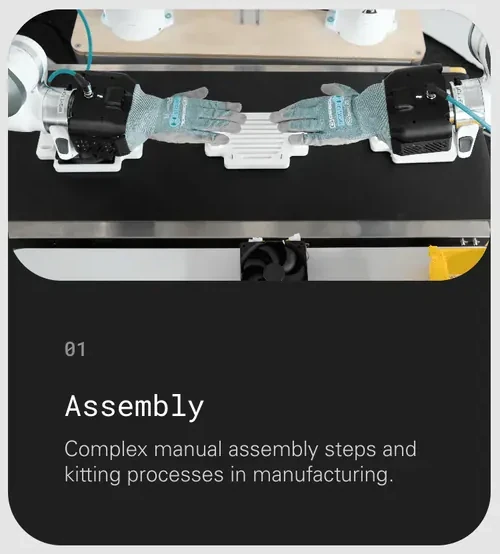 The use case card Assembly: a photo of two gloved robot hands at a workbench above the number 01, the title Assembly and a line of text, on a dark rounded card.