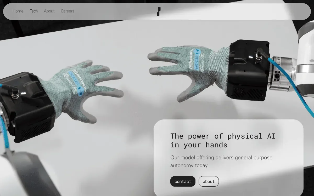 The Tech page: two robot arms with gloved hands reaching toward each other over a white table, and a frosted panel with the line The power of physical AI in your hands and the buttons contact and about.
