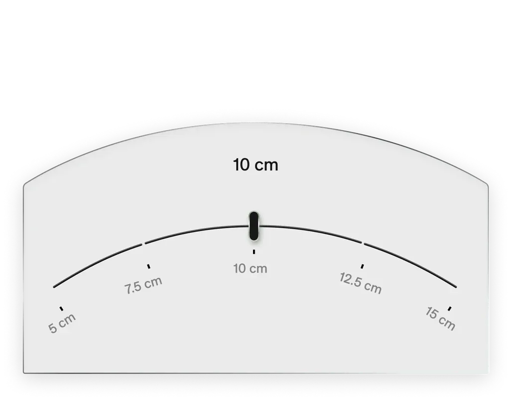 Cantle width tool: a curved scale from 5 cm to 15 cm with a black handle at 10 cm, on a light panel with an arched top.