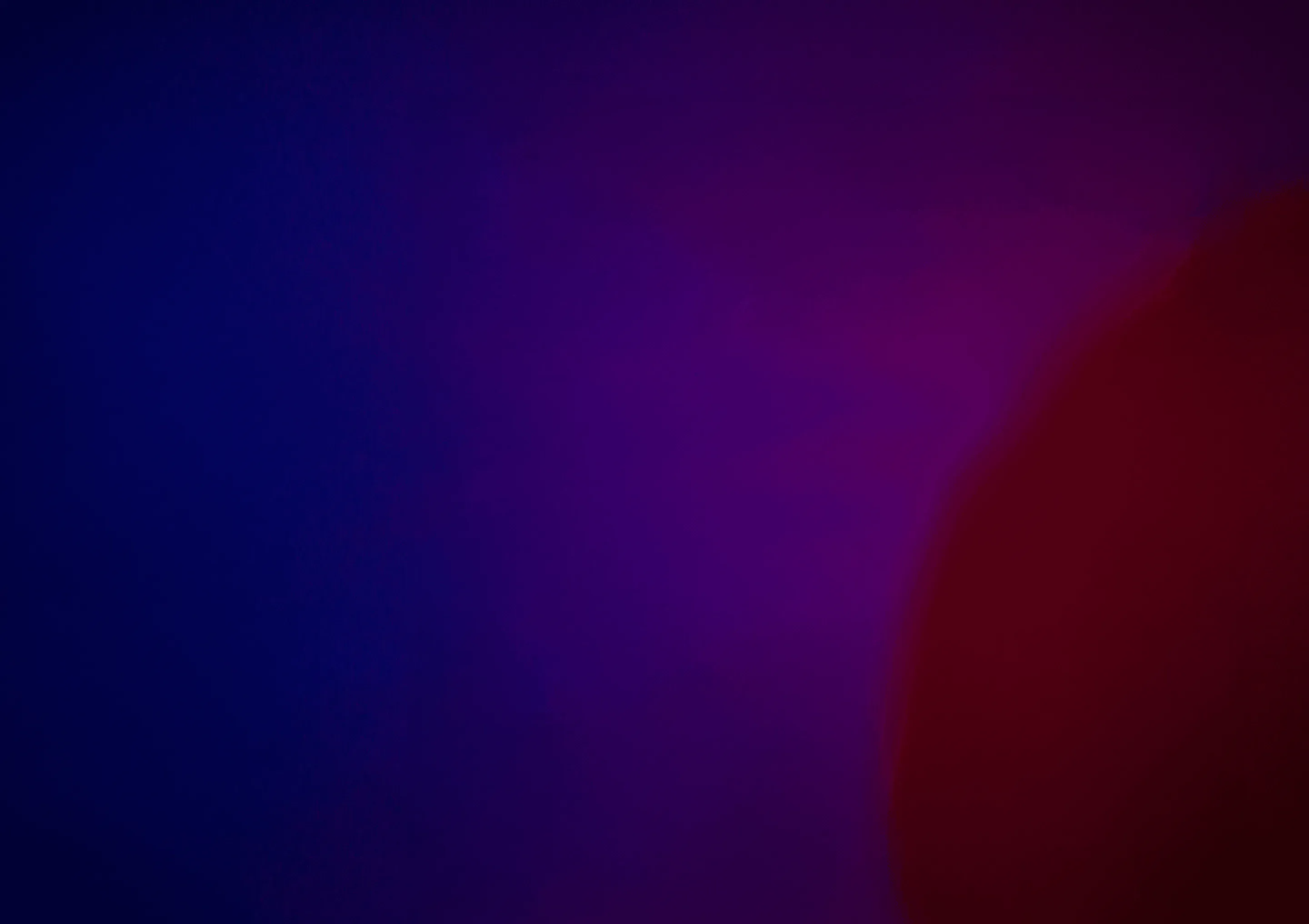 A soft gradient from deep blue to dark red, the ground behind the portrait.