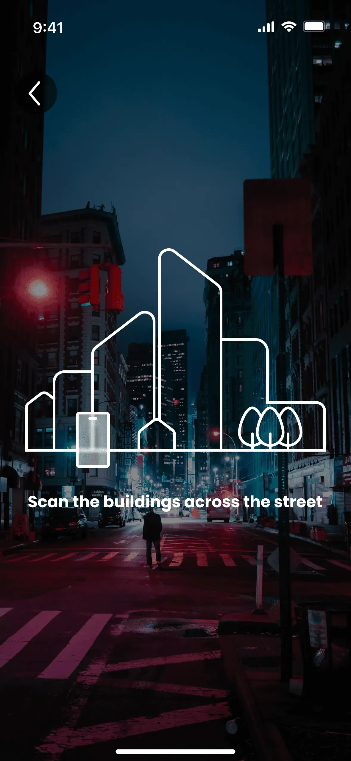 AR camera view of a city street at night with red lights. A white line drawing of buildings and a phone lies over it, with the instruction Scan the buildings across the street.
