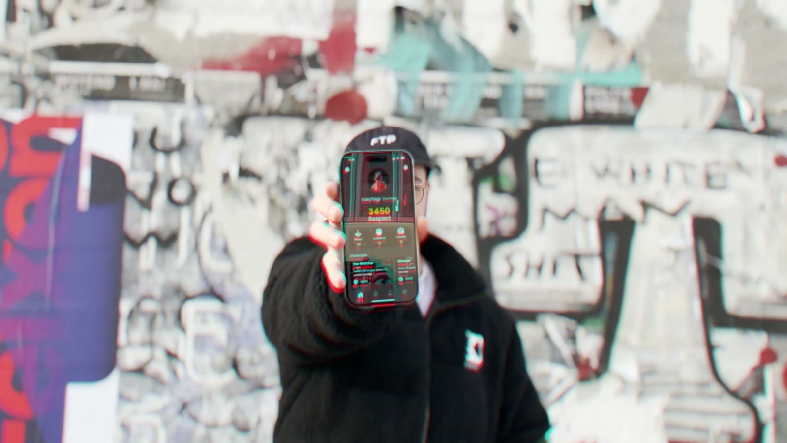 The Visible product pitch film, about three minutes, with sound: a street artist holds up the app on his phone in front of a graffiti wall, then places and scans pieces around a concrete underpass in Zurich.