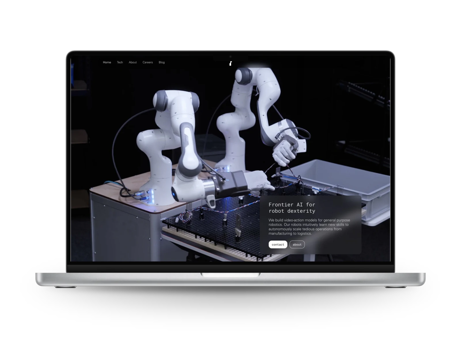 Mimic Robotics: the home page of the website on a laptop, two white robot arms at a work table.